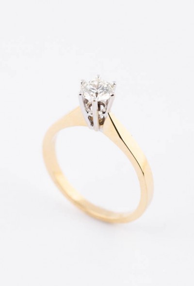 Wit/geel gouden solitair ring met een briljant (0.5 ct.)